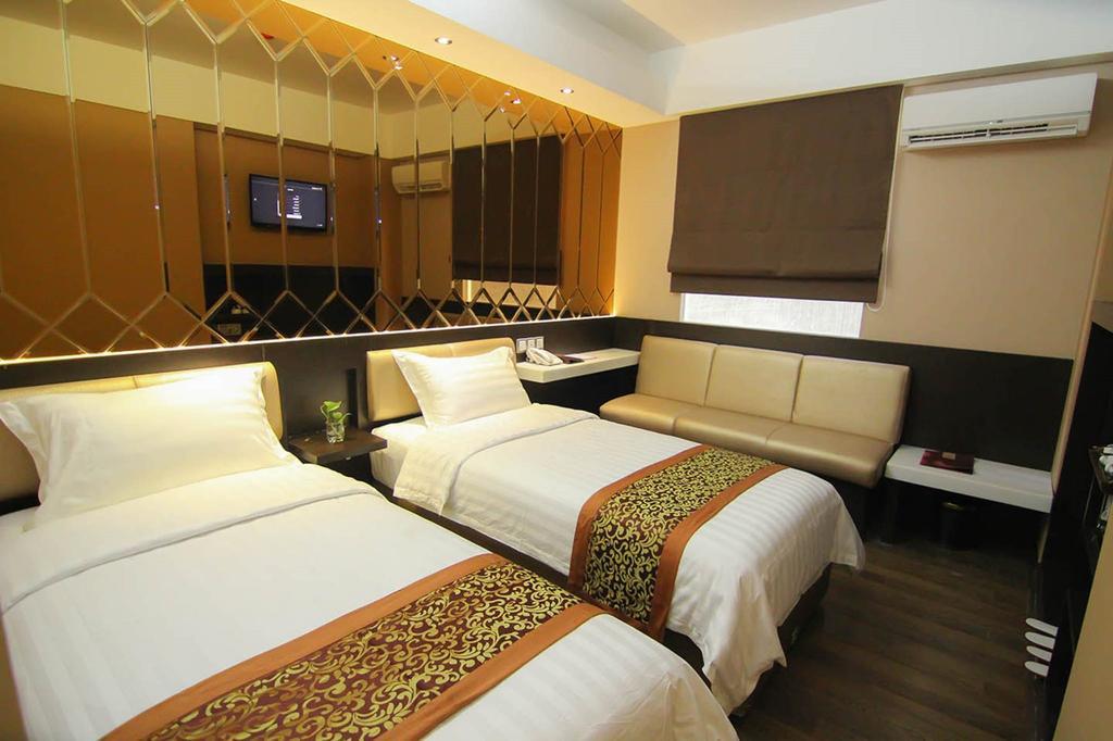 Favor Hotel Makassar City Center By Life Habitación foto